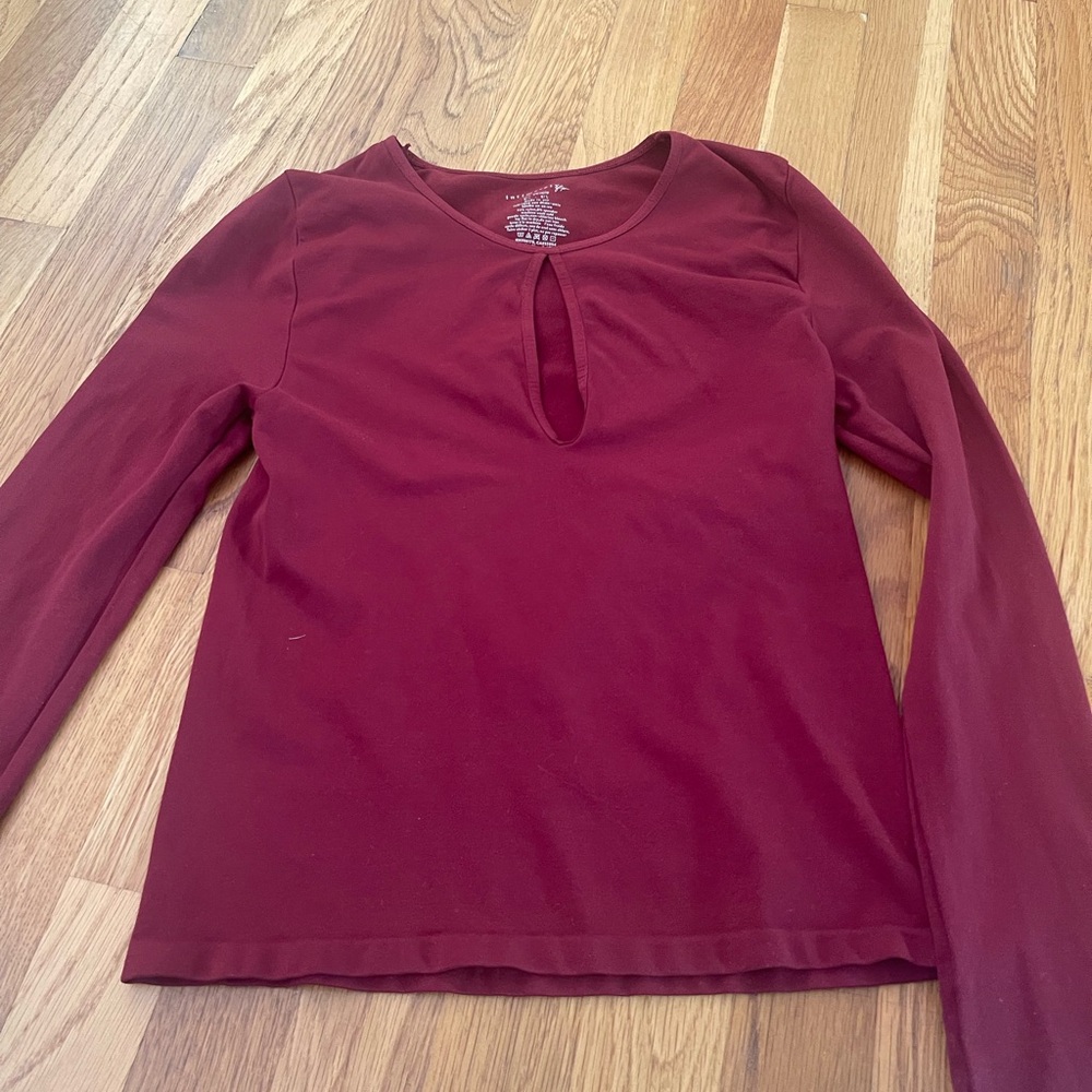 Free people m/l burgundy top with a cutout